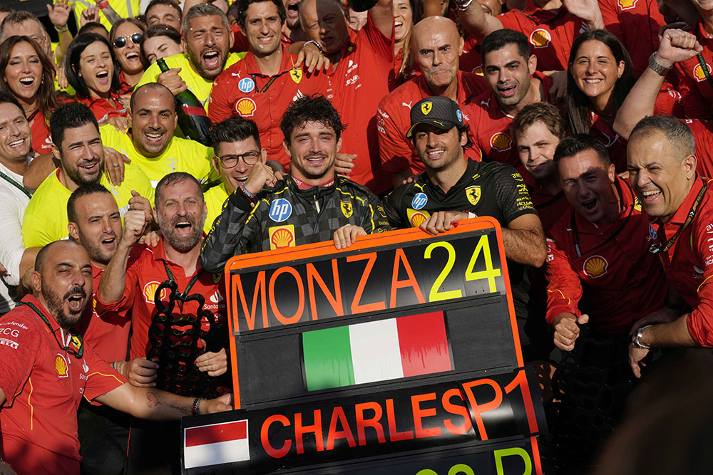 Italian Grand Prix 2024: Ferrari driver Charles Leclerc celebrates with his teammate Ferrari driver Carlos Sainz in the Ferrari garage